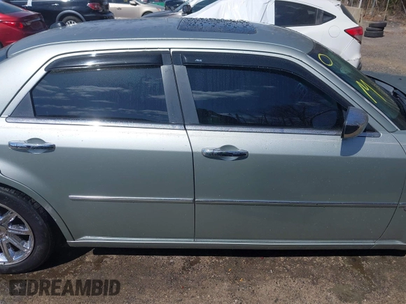 2006 Chrysler 300 C with VIN 2C3LA63H06H105774, listed as a IAAI auction lot 41918634 with 319,232 mi miles. Bid and sale history available at carsss.com. Image 13.