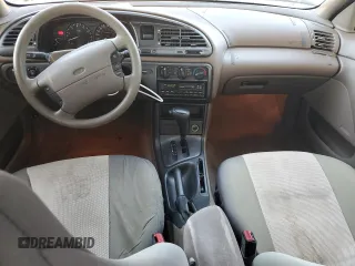 1996 Ford Contour z VIN 1FALP65L3TK117309, wystawiony jako Copart lot #88454995 z przebiegiem 100 401 mil mil oraz Czysty tytuł • Clean title. Historia ofert i sprzedaży dostępna na DreamBid. Obrazek 8.