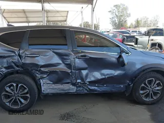 2021 Honda CR-V EX z VIN 2HKRW1H5XMH407361, wystawiony jako IAAI lot #42406157 z przebiegiem 51 493 mil mil oraz . Historia ofert i sprzedaży dostępna na DreamBid. Obrazek 13.