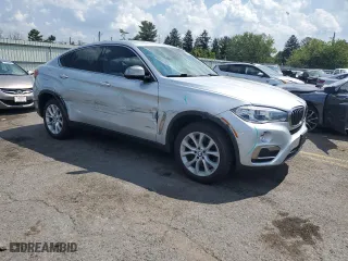 2019 BMW X6 sDrive35i with VIN 5UXKU0C57K0S97385, listed as a Copart auction lot 69103994 with 44,186 mi miles and Salvage Title. Bid and sale history available at carsss.com. Image 4.