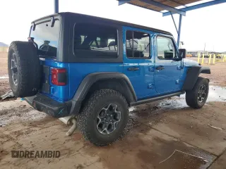 2023 Jeep Wrangler Rubicon with VIN 1C4JJXR69PW581362, listed as a Copart auction lot 58557795 with 34,357 mi miles and Salvage title. Bid and sale history available at DreamBid. Image 3.