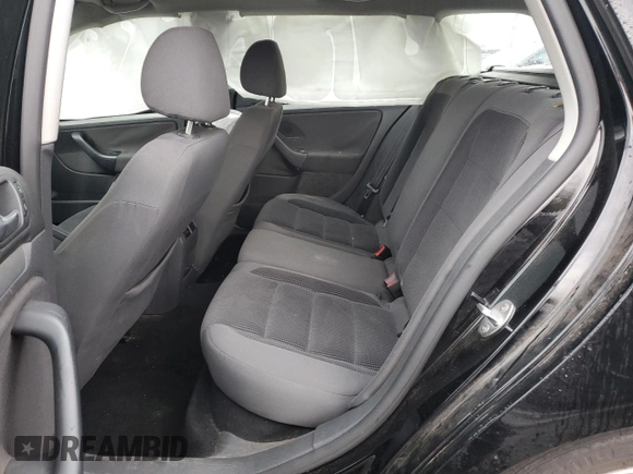 2009 Volkswagen Jetta z VIN 3VWKZ71K09M250143, wystawiony jako Copart lot #82247774 z przebiegiem 156 600 mil mil oraz Szkoda całkowita • Salvage title. Historia ofert i sprzedaży dostępna na DreamBid. Obrazek 10.