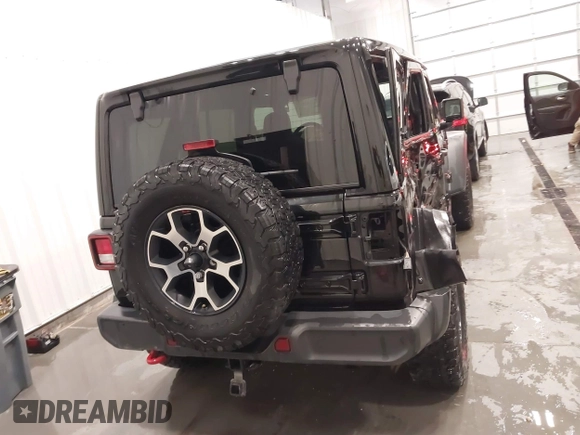2019 Jeep Wrangler Unlimited Rubicon z VIN 1C4HJXFN7KW561193, wystawiony jako IAAI lot #41500907 z przebiegiem 18 697 mil mil oraz . Historia ofert i sprzedaży dostępna na DreamBid. Obrazek 17.