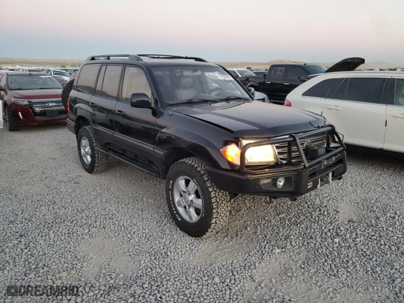 2003 Toyota Land Cruiser with VIN JTEHT05J132049479, listed as a Copart auction lot 74533464 with 218,413 mi miles and Salvage Title. Bid and sale history available at carsss.com. Image 4.