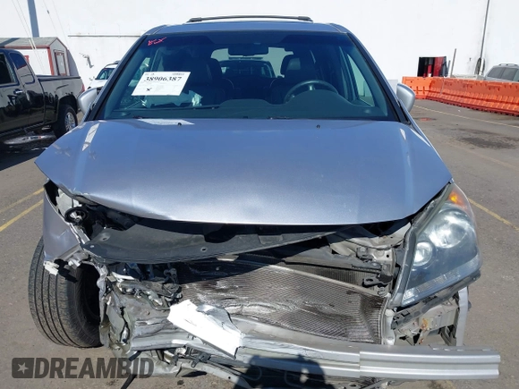 2010 Honda Odyssey EX-L with VIN 5FNRL3H78AB006181, listed as a IAAI auction lot 38906387 with 171,426 mi miles and . Bid and sale history available at DreamBid. Image 13.