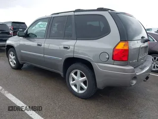 2008 GMC Envoy SLE2 with VIN 1GKDT13S482244279, listed as a IAAI auction lot 42144735 with 221,682 mi miles. Bid and sale history available at carsss.com. Image 3.