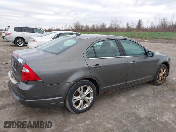 2012 Ford Fusion SE with VIN 3FAHP0HA7CR104815, listed as a IAAI auction lot 42089122 with 151,129 mi miles. Bid and sale history available at carsss.com. Image 12.