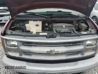 1999 Chevrolet Express with VIN 1GAHG39R5X1151916, listed as a Copart auction lot 79770974 with 132,965 mi miles and Salvage Title. Bid and sale history available at carsss.com. Image 12.