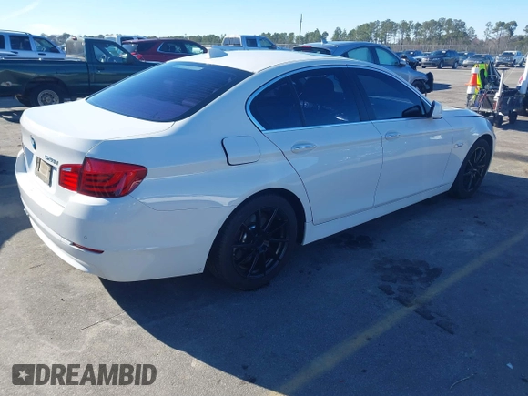 2013 BMW 5 Series 528i with VIN WBAXG5C53DD232909, listed as a IAAI auction lot 41620696 with 181,375 mi miles and . Bid and sale history available at carsss.com. Image 4.