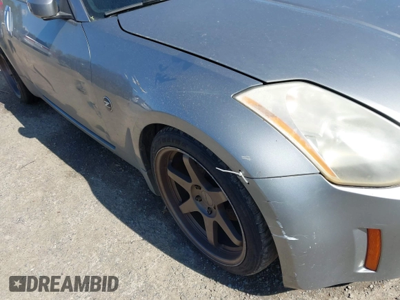 2003 Nissan 350Z Touring z VIN JN1AZ34E03T004458, wystawiony jako IAAI lot #42361684 z przebiegiem 147 847 mil mil oraz . Historia ofert i sprzedaży dostępna na DreamBid. Obrazek 6.