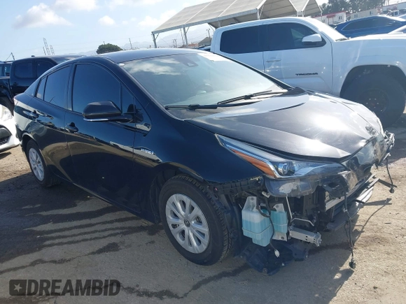 2020 Toyota Prius L Eco z VIN JTDKARFU6L3104385, wystawiony jako IAAI lot #41922029 z przebiegiem 123 235 mil mil oraz . Historia ofert i sprzedaży dostępna na DreamBid. Obrazek 1.