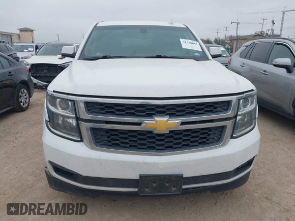 2015 Chevrolet Tahoe LS with VIN 1GNSCAEC2FR641252, listed as a IAAI auction lot 41528667 with 183,796 mi miles and . Bid and sale history available at DreamBid. Image 12.