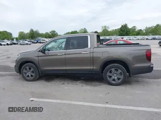 2020 Honda Ridgeline RTL-E with VIN 5FPYK3F78LB001882, listed as a IAAI auction lot 42352980 with 63,278 mi miles and . Bid and sale history available at DreamBid. Image 15.