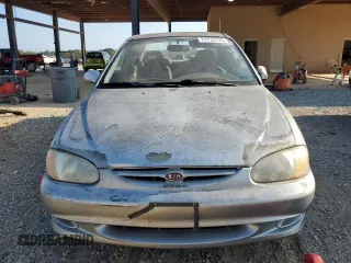 2001 Kia Sephia z VIN KNAFB121715014673, wystawiony jako Copart lot #71712174 z przebiegiem 83 277 mil mil oraz Szkody całkowita. Historia ofert i sprzedaży dostępna na DreamBid. Obrazek 5.