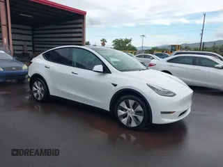 2020 Tesla Model Y Long Range z VIN 5YJYGDEE3LF043800, wystawiony jako IAAI lot #41590220 z przebiegiem 62 341 mil mil oraz . Historia ofert i sprzedaży dostępna na DreamBid. Obrazek 1.