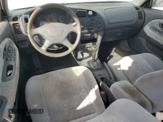 2001 Mitsubishi Mirage ES z VIN JA3AY26CX1U030593, wystawiony jako Copart lot #83749264 z przebiegiem 107 641 mil mil oraz Szkoda całkowita • Salvage title. Historia ofert i sprzedaży dostępna na DreamBid. Obrazek 8.
