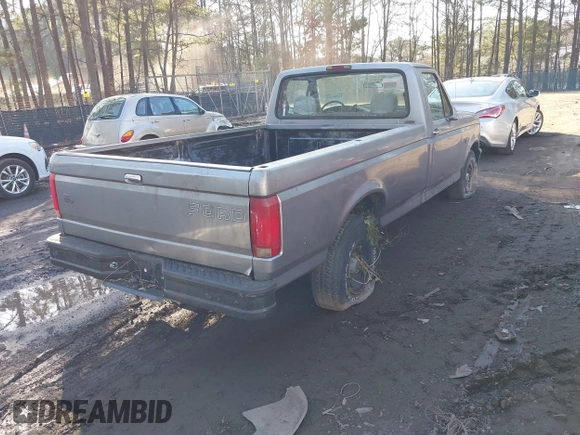 1995 Ford F-150 with VIN 1FTDF15YXSNA29547, listed as a IAAI auction lot 41569707 with 185,000 mi miles. Bid and sale history available at carsss.com. Image 4.