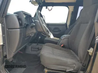 2005 Jeep Wrangler X z VIN 1J4FA39S75P321328, wystawiony jako Copart lot #59711505 z przebiegiem 126 768 mil mil oraz Szkoda całkowita • Salvage title. Historia ofert i sprzedaży dostępna na DreamBid. Obrazek 7.