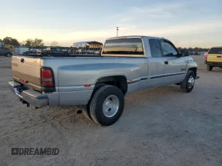 1999 Dodge Ram 3500 with VIN 1B7MC3361XJ646338, listed as a Copart auction lot 82956324 with 180,651 mi miles and Salvage Title. Bid and sale history available at carsss.com. Image 3.
