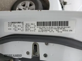 2011 Ram 1500 SLT with VIN 1D7RB1GP0BS672907, listed as a Copart auction lot 61641725 with 130,826 mi miles and Salvage title. Bid and sale history available at DreamBid. Image 12.