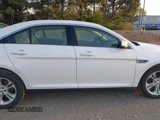 2015 Ford Taurus SEL with VIN 1FAHP2E82FG202143, listed as a IAAI auction lot 42053737 with 113,839 mi miles and . Bid and sale history available at carsss.com. Image 13.