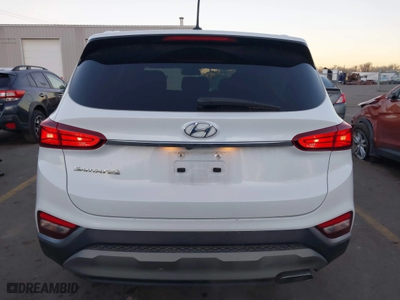 2019 Hyundai Santa Fe SE with VIN 5NMS23AD9KH077362, listed as a IAAI auction lot 41890584 with 132,476 mi miles. Bid and sale history available at carsss.com. Image 16.