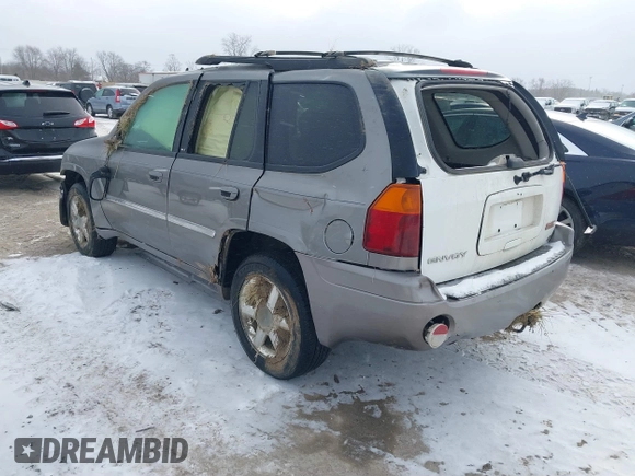 2007 GMC Envoy SLE with VIN 1GKDT13S072246688, listed as a IAAI auction lot 41258265 with 218,001 mi miles. Bid and sale history available at carsss.com. Image 3.