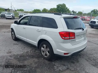 2012 Dodge Journey SXT with VIN 3C4PDCBG3CT331693, listed as a IAAI auction lot 42624751 with 165,480 mi miles and . Bid and sale history available at DreamBid. Image 3.