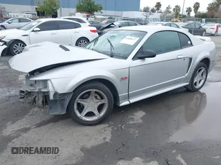 1999 Ford Mustang GT with VIN 1FAFP42X0XF215981, listed as a IAAI auction lot 41806677 with 152,295 mi miles. Bid and sale history available at carsss.com. Image 18.
