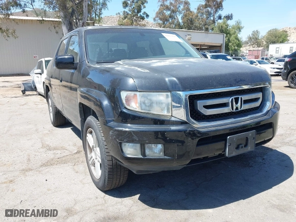 2011 Honda Ridgeline RTL with VIN 5FPYK1F50BB001442, listed as a IAAI auction lot 42023615 with 189,170 mi miles. Bid and sale history available at carsss.com. Image 6.