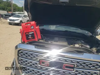 2021 GMC Sierra 1500 Denali with VIN 3GTU9FETXMG284784, listed as a Copart auction lot 62069135 with 66,374 mi miles and Salvage title. Bid and sale history available at DreamBid. Image 14.