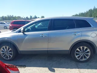2014 Mazda CX-9 Grand Touring with VIN JM3TB2DA9E0435295, listed as a IAAI auction lot 42618683 with 177,783 mi miles and . Bid and sale history available at DreamBid. Image 14.