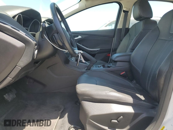 2014 Ford Focus Titanium with VIN 1FADP3N2XEL423320, listed as a Copart auction lot 58709875 with 93,011 mi miles and Salvage title. Bid and sale history available at DreamBid. Image 7.
