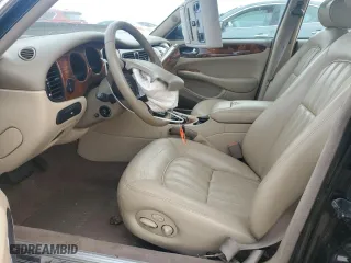 2000 Jaguar XJ with VIN SAJDA14C7YLF11390, listed as a Copart auction lot 73054184 with 0 mi miles and Salvage Title. Bid and sale history available at carsss.com. Image 7.