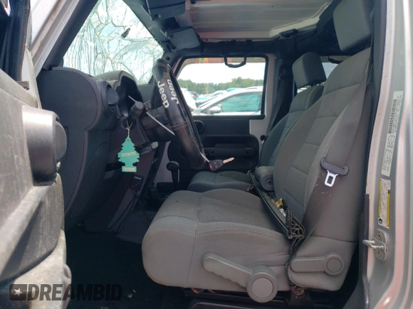 2007 Jeep Wrangler Unlimited Sahara с VIN 1J4GA591X7L158014, выставлен на аукционе Copart как лот 55201105 с пробегом 162 797 миль миль и Списание • Salvage title. История ставок и продаж доступна на DreamBid. Изображение 7.