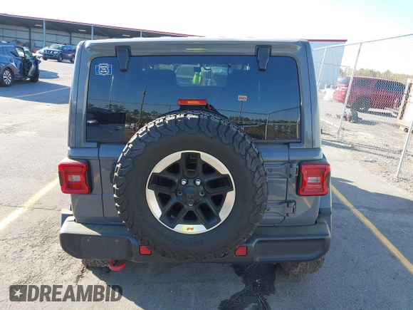 2020 Jeep Wrangler Unlimited Rubicon with VIN 1C4HJXFN4LW136516, listed as a IAAI auction lot 41874403 with 87,576 mi miles. Bid and sale history available at carsss.com. Image 16.