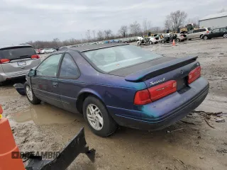 1996 Ford Thunderbird LX with VIN 1FALP6244TH118429, listed as a Copart auction lot 47677935 with 167,726 mi miles and Salvage Title. Bid and sale history available at carsss.com. Image 2.