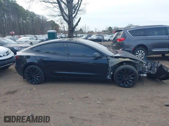 2023 Tesla Model 3 Long Range with VIN 5YJ3E1EB6PF673532, listed as a IAAI auction lot 41885716 with 39,690 mi miles and . Bid and sale history available at DreamBid. Image 13.