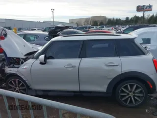 2019 MINI Hardtop 4 Door Cooper S with VIN WMWXU3C59K2H87159, listed as a IAAI auction lot 41225965 with 76,640 mi miles and . Bid and sale history available at DreamBid. Image 14.