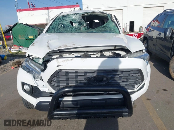 2022 Toyota Tacoma SR5 with VIN 3TMDZ5BNXNM122169, listed as a IAAI auction lot 41992758 with 36,686 mi miles and . Bid and sale history available at DreamBid. Image 6.