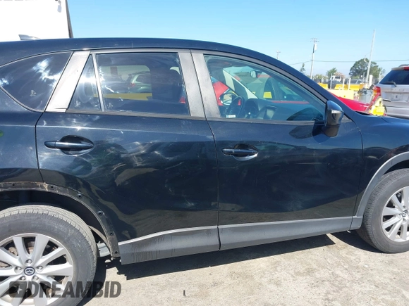 2016 Mazda CX-5 Touring z VIN JM3KE4CY2G0656270, wystawiony jako IAAI lot #42344489 z przebiegiem 60 449 mil mil oraz . Historia ofert i sprzedaży dostępna na DreamBid. Obrazek 14.