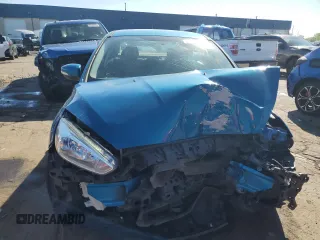 2017 Ford Focus SE with VIN 1FADP3F23HL203794, listed as a Copart auction lot 57202435 with 116,824 mi miles and Salvage title. Bid and sale history available at DreamBid. Image 5.