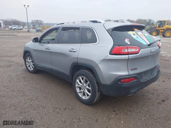 2014 Jeep Cherokee Latitude with VIN 1C4PJLCS5EW101565, listed as a IAAI auction lot 40845256 with 122,969 mi miles. Bid and sale history available at carsss.com. Image 3.