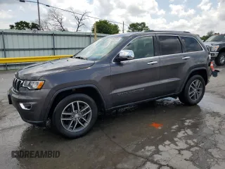 2018 Jeep Grand Cherokee Limited with VIN 1C4RJEBG1JC300335, listed as a Copart auction lot 61853325 with 107,137 mi miles and Salvage title. Bid and sale history available at DreamBid. Image 1.