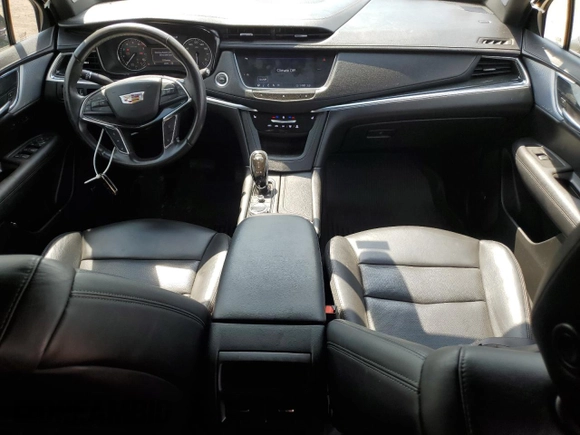 2020 Cadillac XT5 Premium Luxury AWD z VIN 1GYKNDRS4LZ142738, wystawiony jako Copart lot #61247675 z przebiegiem 60 353 mil mil oraz Szkoda całkowita • Salvage title. Historia ofert i sprzedaży dostępna na DreamBid. Obrazek 8.
