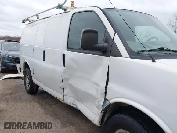 2015 Chevrolet Express Cargo Van with VIN 1GCWGFCFXF1259591, listed as a IAAI auction lot 42029679 with 144,023 mi miles. Bid and sale history available at carsss.com. Image 6.