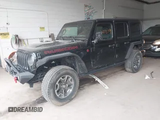 2021 Jeep Wrangler Unlimited Rubicon with VIN 1C4HJXFN2MW587168, listed as a IAAI auction lot 42472309 with 66,272 mi miles and . Bid and sale history available at DreamBid. Image 2.