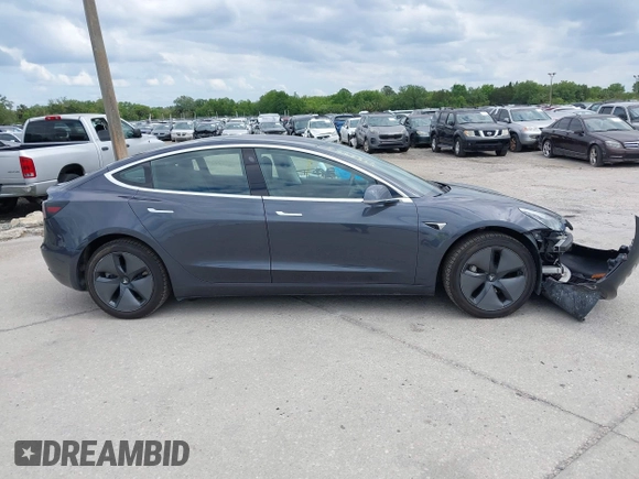 2018 Tesla Model 3 Long Range Battery with VIN 5YJ3E1EB3JF119498, listed as a IAAI auction lot 41966643 with 45,566 mi miles and . Bid and sale history available at DreamBid. Image 14.