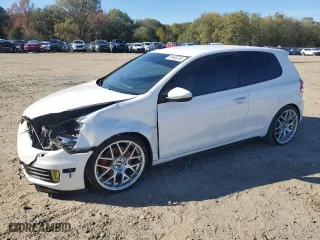 2013 Volkswagen GTI with VIN WVWFV7AJ5DW026592, listed as a Copart auction lot 81446704 with 118,159 mi miles and Salvage Title. Bid and sale history available at carsss.com. Image 1.