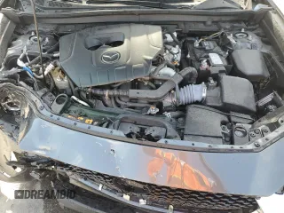 2023 Mazda CX-30 S Premium z VIN 3MVDMBDM9PM558451, wystawiony jako Copart lot #53997465 z przebiegiem 27 633 mil mil oraz Nie do naprawy • Non repairable. Historia ofert i sprzedaży dostępna na DreamBid. Obrazek 12.